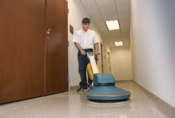 man cleaning the floor 